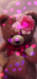 Fluffy teddy bear with pink flowers.