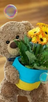 Teddy bear holding sunflowers with wooden background.