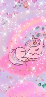 Cute unicorn surrounded by pink sparkles and a rainbow.