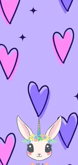 Lavender wallpaper with unicorn and heart designs.