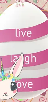 Whimsical unicorn wallpaper with live laugh love text.