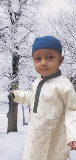 Child in traditional dress standing in snowy winter scene.