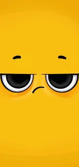 Cute yellow face wallpaper with sleepy, cartoonish eyes.