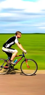 Cyclist zooming on a rural road with lush green background.