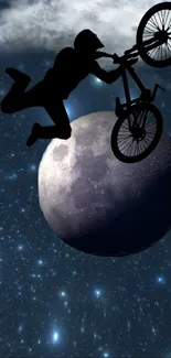 Cyclist performs a jump over the moon in a starry night scene wallpaper.