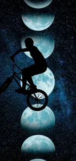 Cyclist silhouette with moons and stars in a dark blue sky.