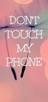 Dandelion wallpaper with 'Don't Touch My Phone' text.