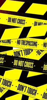 Vibrant yellow caution tape wallpaper with 'Do Not Cross' signs.