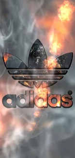 Adidas logo on dark smoky background with fiery highlights.