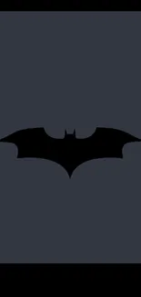 A dark silhouette of a bat on a charcoal gray background, perfect for minimalist fans.