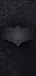 Dark bat symbol on textured black background wallpaper.