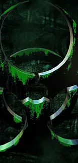 Dark biohazard symbol on green background.