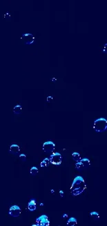 Dark blue wallpaper with glowing bubbles against a deep background.