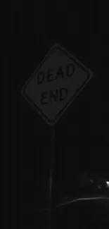 Dark wallpaper featuring a 'Dead End' street sign.