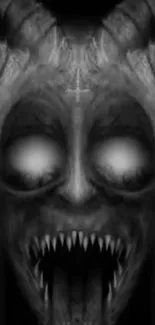 Dark demon face with horns and eerie eyes in black and gray hues.