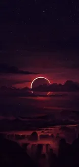 Dark red night sky with eclipse over mountains wallpaper.