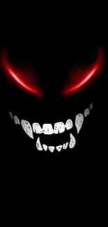 Mysterious face with glowing red eyes on dark background.