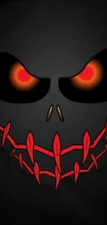 Dark wallpaper featuring a fiery face with glowing red eyes and an eerie smile.