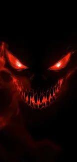 Fiery skull with red eyes in darkness, menacing aura.