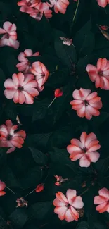 Dark floral wallpaper with pink flowers and green leaves.