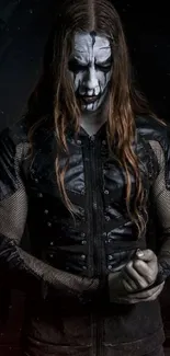 Gothic metal wallpaper with face-painted figure in dark attire.