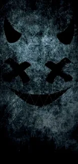 Dark grunge wallpaper with a devilish smiley face.