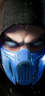 Wallpaper of a dark hooded warrior with a blue mask and glowing eyes.