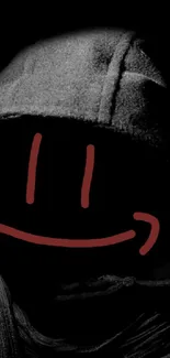 Dark hooded figure with red smiley face on black background.