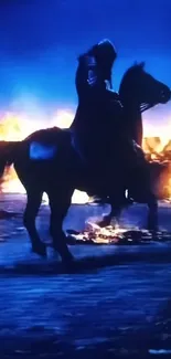 Silhouette of a horse standing against a fiery backdrop at night.