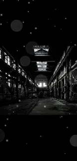 Dark industrial warehouse with shadowy interior.