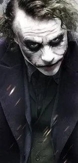 Dark, intense clown makeup character close-up.