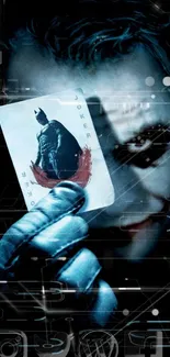 Joker holding a Batman card with dark, intense background design.