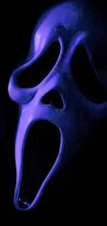 Dark purple mask on a black background, eerie and mysterious.