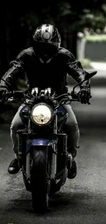 Motorcycle rider in black gear on a road with a dark, mysterious setting.