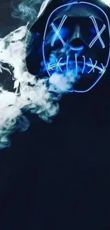 Dark hoodie figure with blue neon mask emitting smoke.