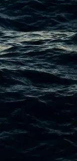 Dark ocean waves creating a calming mobile wallpaper.