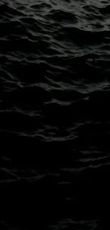 Mobile wallpaper featuring dark ocean waves.