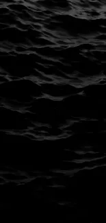 Dark ocean waves creating a moody and serene background.