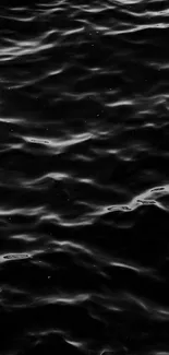 Dark ocean waves create a mysterious mobile wallpaper.