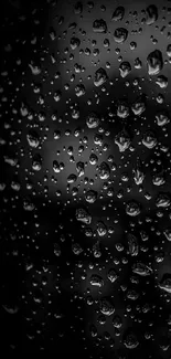 Dark wallpaper with raindrops adding a moody, elegant texture.