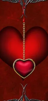 Dark red heart with chain pendant in a gothic style wallpaper.