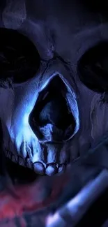 Dark artistic skull wallpaper with blue shadows.