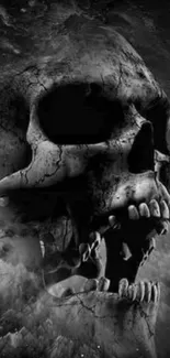 Dark, intricate skull design mobile wallpaper in black and grey.