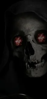 Dark skull with glowing red eyes in a black background.