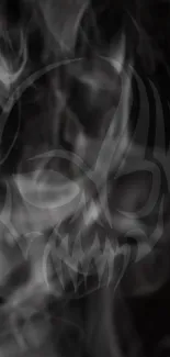 Dark smoke skull design on black wallpaper.