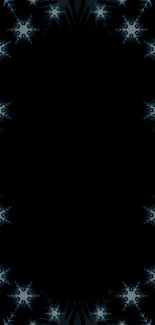 Dark wallpaper with snowflake patterns on a black background.