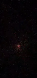 Dark space wallpaper with stars and red cosmic dust center.