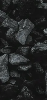 Dark stone texture wallpaper with black rocks.