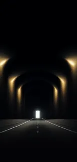 Mysterious dark tunnel with golden light glow.