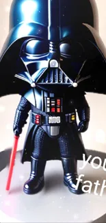 Darth Vader figure with lightsaber on wallpaper.